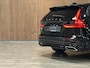 Volvo V60 T6 AWD Recharge R-Design Adaptieve Cruise Control | Stoel en Stuurwielverwarming | Parkeercamera | Full LED Meesturende koplampen | Pilot Assist | Bestuurdersstoel elektrisch geheugen | Contour stoelen met wit stiksel en bies | Zitting verlenging voorstoelen | 18 Inch | Keyless Drive | Parkeersensoren voor+achter | Privacy Glass | Elektrisch bedienbare achterklep | DAB Radio | Apple Carplay/Android Auto | Volvo On Call met mobiele App functie |