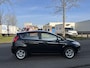 Ford Fiesta 1.0i EcoBoost Titanium 5-Deurs 125 PK. Mooie en zeer fijn rijdende auto !!! Distributieriem en waterpomp zijn vervangen !!