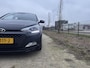 Hyundai i20 1.2 HP Premium | Cruise Control | Climate Control | Navigatie | Achteruitrijcamera | Zomer/Winterbanden Set |