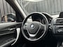 BMW 1-Serie 116i Business+ Trekhaak PANO AUT LEER