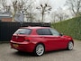 BMW 1-Serie 116i Business+ Trekhaak PANO AUT LEER