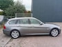 BMW 3-Serie Touring 320i Luxury Line Climate Cruise Leer Navigatie Xenon 2 sleutels Ond. Map NAP APK 06-2026