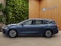 Ford Focus Wagon 1.0 EcoBoost Hybrid Titanium | All season | Navi | Apple Carplay | Cruise | Lane Assist | 16''