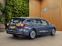 Ford Focus Wagon 1.0 EcoBoost Hybrid Titanium | All season | Navi | Apple Carplay | Cruise | Lane Assist | 16''