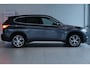 BMW X1 sDrive20i High Executive | Adapt. Cruise | HUD | Leder | Stoelverwarming | Keyless | Camera | Elektr. Klep |