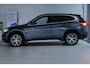 BMW X1 sDrive20i High Executive | Adapt. Cruise | HUD | Leder | Stoelverwarming | Keyless | Camera | Elektr. Klep |