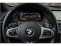 BMW 1-Serie M135i xDrive | Live Cockpit | Panorama | Schaalstoelen | Memory | H&K | Head-Up | 19"LM | Storm Bay Metallic