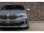 BMW 1-Serie M135i xDrive | Live Cockpit | Panorama | Schaalstoelen | Memory | H&K | Head-Up | 19"LM | Storm Bay Metallic