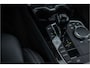 BMW 1-Serie M135i xDrive | Live Cockpit | Panorama | Schaalstoelen | Memory | H&K | Head-Up | 19"LM | Storm Bay Metallic