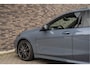 BMW 1-Serie M135i xDrive | Live Cockpit | Panorama | Schaalstoelen | Memory | H&K | Head-Up | 19"LM | Storm Bay Metallic