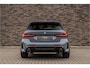 BMW 1-Serie M135i xDrive | Live Cockpit | Panorama | Schaalstoelen | Memory | H&K | Head-Up | 19"LM | Storm Bay Metallic