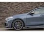 BMW 1-Serie M135i xDrive | Live Cockpit | Panorama | Schaalstoelen | Memory | H&K | Head-Up | 19"LM | Storm Bay Metallic