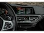 BMW 1-Serie M135i xDrive | Live Cockpit | Panorama | Schaalstoelen | Memory | H&K | Head-Up | 19"LM | Storm Bay Metallic