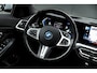 BMW 3-Serie Touring 330e | M-Pakket | Panoramadak | HUD | Curved Display | Sportstoelen | Adaptieve Cruise Control | Ele. verstelbare stoelen + Geheugen | Camera | DAB | Apple CarPlay/Android Auto | LED |