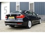 BMW 3-Serie Gran Turismo 320i High Executive Rijklaarprijs-Garantie Panorama dak Trekhaak Leder Led Navigatie