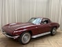 Corvette C2 Corvette Coupé / Matching Numbers / 350 PK / 4-Speed Manual / Milano Maroon Red / 1965 / Sidepipes / Kelsey Hayes Knock Off