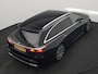 Mercedes-Benz E-klasse Estate 300 e Luxury Line PHEV 313pk Dealer O.H | Luchtvering | Trekhaak af Fabriek | Lederen Comfortzetels Memory | Adaptive Cruise | Burmester 4D | Digital LED | 360 Camera | Keyless | Sfeerverlichting | Plug In Hybrid