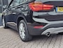 BMW X1 sDrive20i Centennial High Executive | Automaat | Navi | Stoelverwarming | HUD | Parkeersensoren | Leder |