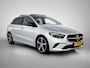 Mercedes-Benz B-klasse 180 Luxury Line | Trekhaak  | Panoramadak | Achteruitrijcamera | Sfeerverlichting | Inclusief 24 maanden MB Certified garantie voor Europa.