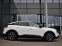 Citroën E-C4 Shine 50 kWh | Keyless entry en start | 18 inch lichtmetalen velgen | Achteruitrijcamera | Adaptive cruise control | Head up display | Climate control | Extra getint glas