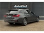 BMW 3-Serie Touring 330e xDrive | Sportleder | Head-Up | Laserlicht | Comfort Access | Memory