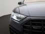 Audi Q5 2.0 TFSI e-hybrid quattro Advanced edition l Adaptive cruise control l Glazen panoramadak l Head-up display l Stoelverwarming l Elektrisch bedienbare bestuurdersstoel met geheugen l Navigatie l Elektrisch verstelbaar stuur l Trekhaak l Privacy glas