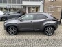 Toyota Yaris Cross 1.5 Hybrid 115 First Edition ALL-SEASON STOEL/STUURVERW KEYLESS DRAADLOOS-LADEN APPLE/ANDROID CAMERA AD-CRUISE LM-VELGEN BLUETOOTH DAB+