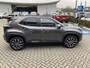 Toyota Yaris Cross 1.5 Hybrid 115 First Edition ALL-SEASON STOEL/STUURVERW KEYLESS DRAADLOOS-LADEN APPLE/ANDROID CAMERA AD-CRUISE LM-VELGEN BLUETOOTH DAB+