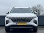 Hyundai Tucson 1.6 T-GDI 265PK PHEV Comfort 4WD | Lage kmstand Plug-inn | Geïntegreerde navigatiesysteem | 19'' Bi-color Lichtmetalen velgen | Vierwielaandrijving |