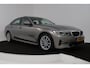 BMW 3-Serie 320i High Executive Edition Automaat (PANORAMADAK, CAMERA, STOELVERWARMING, SPORTSTOELEN, DEALER ONDERHOUDEN, LEDER)