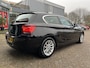 BMW 1-Serie 114i EDE Corporate Lease Edition Cruise, Navi, Parkeersensoren.