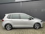 Volkswagen Golf Sportsvan 1.5 TSI ACT Comfortline Airco - Cruise control - Navigatiesysteem - Parkeersensoren voor en achter - Trekhaak - Voorstoelen verwarmd - Licht metalen velgen 16 inch - Radio - Start/stop systeem - Stuur leder - Stuur