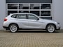 BMW X1 SDrive18d | Panoramadak | Sportstoelen | Cruise control | PDC | Trekhaak