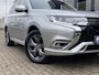 Mitsubishi Outlander 2.4 PHEV Intense / Automaat / NL-Auto / Dealer-Onderhouden / 1e-Eigenaar / AWD / Afneembare-Trekhaak / Standkachel / Cruise-Control / Climate-Control / Stoelverwarming / Elektr.-Stoelen / Apple-Carplay & Android-Auto / Dodehoek-Detectie / LED / Keyless / DAB Radio-Bluetooth / Camera / PDC V+A / 18'' LMV / All-Season / ENZ.