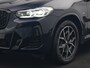 BMW X4 xDrive20i M Sport 184pk Dealer O.H. Carbon Schwarz Metallic | Adaptive Cruise | Camera | Sfeerverlichting | Lederen Sportstoelen Verwarmd | Apple Carplay | Virtual Cockpit | Navigatie | DAB | 19"L.M |