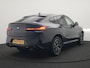BMW X4 xDrive20i M Sport 184pk Dealer O.H. Carbon Schwarz Metallic | Adaptive Cruise | Camera | Sfeerverlichting | Lederen Sportstoelen Verwarmd | Apple Carplay | Virtual Cockpit | Navigatie | DAB | 19"L.M |