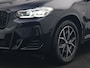 BMW X4 xDrive20i M Sport 184pk Dealer O.H. Carbon Schwarz Metallic | Adaptive Cruise | Camera | Sfeerverlichting | Lederen Sportstoelen Verwarmd | Apple Carplay | Virtual Cockpit | Navigatie | DAB | 19"L.M |