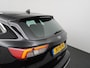 Ford Kuga 2.5 PHEV Titanium | 4 seizoenen banden | Stoel-, Stuur- & Voorruitverw. |