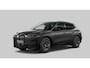 BMW iX xDrive40 Executive 77 kWh Trekhaak - Panoramadak - Driving/Parking Assistant Professional - Luchtvering - Comfort Access - Soft close - Getinte Ruiten - Hemelbekleding in Anthrazit -