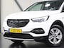 Opel Grandland X 1.2 130PK Turbo Business Executive | 1ste eigenaar | AppleCarPlay/AndroidAuto | Trekhaak | Camera | AGR Bestuurdersstoel | Dodehoekdetectie | Navigatie | Isofix | Privacy Glass | Elektrische Klep |