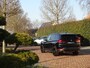 BMW X1 sDrive20i Sportif | All-Black | Uniek | Custom | 19 inch | Nav
