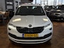 Skoda Karoq 1.5 TSI ACT Sportline Business | Navigatie | Stoelverwarming | Stuurwiel Verwarmd | Camera | Navigatie | Climate Control | Adaptieve Cruise Control | LED Koplampen | KEyless | Metallic | All Season Banden |