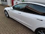 Tesla Model 3 RWD 60 KWH Premium Highland/ 19 Inch velgen/ Getinte ramen/ Warmtepomp/ LFP accu/ Stoel + stuurwiel verwarming/ Panoramadak/ Origineel NL/ NAP