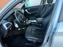 BMW 1-Serie 118i Upgrade Edition automaat NAV.+ Airco Bj:2012 NAP!