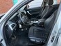 BMW 1-Serie 118i Upgrade Edition automaat NAV.+ Airco Bj:2012 NAP!