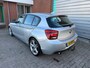 BMW 1-Serie 118i Upgrade Edition automaat NAV.+ Airco Bj:2012 NAP!