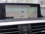 BMW 1-Serie 120i High Executive | Navigatie/Carplay | LM Velgen 18" | Voorstoelen Verwarmd | Cruise Control | Lederen Bekleding | Achteruitrijcamera | Airco |