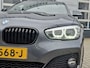 BMW 1-Serie 120i High Executive | Navigatie/Carplay | LM Velgen 18" | Voorstoelen Verwarmd | Cruise Control | Lederen Bekleding | Achteruitrijcamera | Airco |