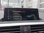 BMW 1-Serie 120i High Executive | Navigatie/Carplay | LM Velgen 18" | Voorstoelen Verwarmd | Cruise Control | Lederen Bekleding | Achteruitrijcamera | Airco |