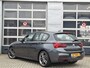 BMW 1-Serie 120i High Executive | Navigatie/Carplay | LM Velgen 18" | Voorstoelen Verwarmd | Cruise Control | Lederen Bekleding | Achteruitrijcamera | Airco |